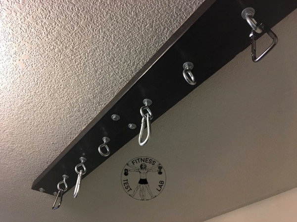 Premium Photo | Close-up of gymnastic rings hanging from ceiling